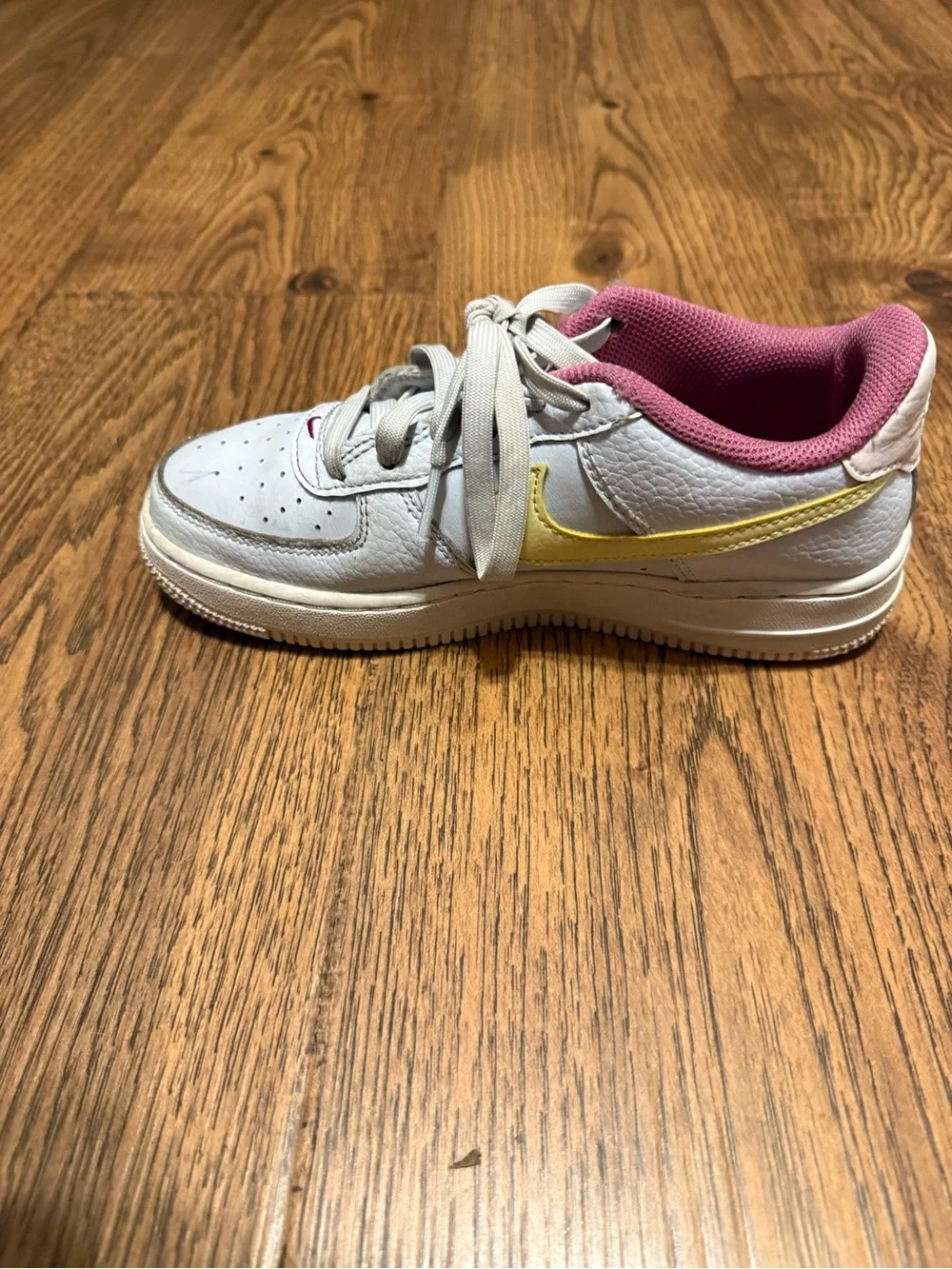 Nike Kids White Sneakers with Yellow Swoosh and Pink Lining